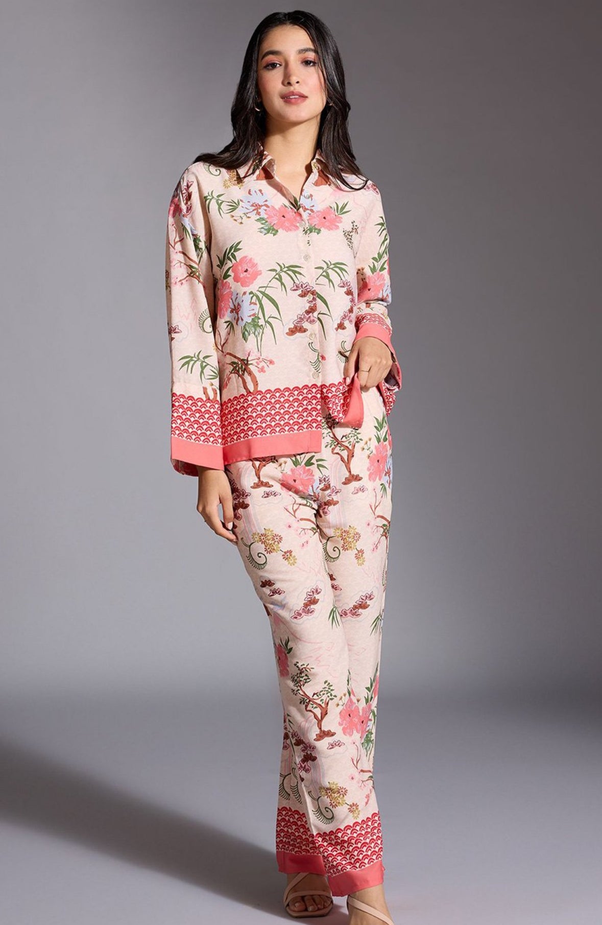 <img src="image.jpg" alt="2-piece silk summer co-ord set featuring a matching top and bottom, designed in lightweight, breathable silk for a chic and comfortable warm-weather look.">
